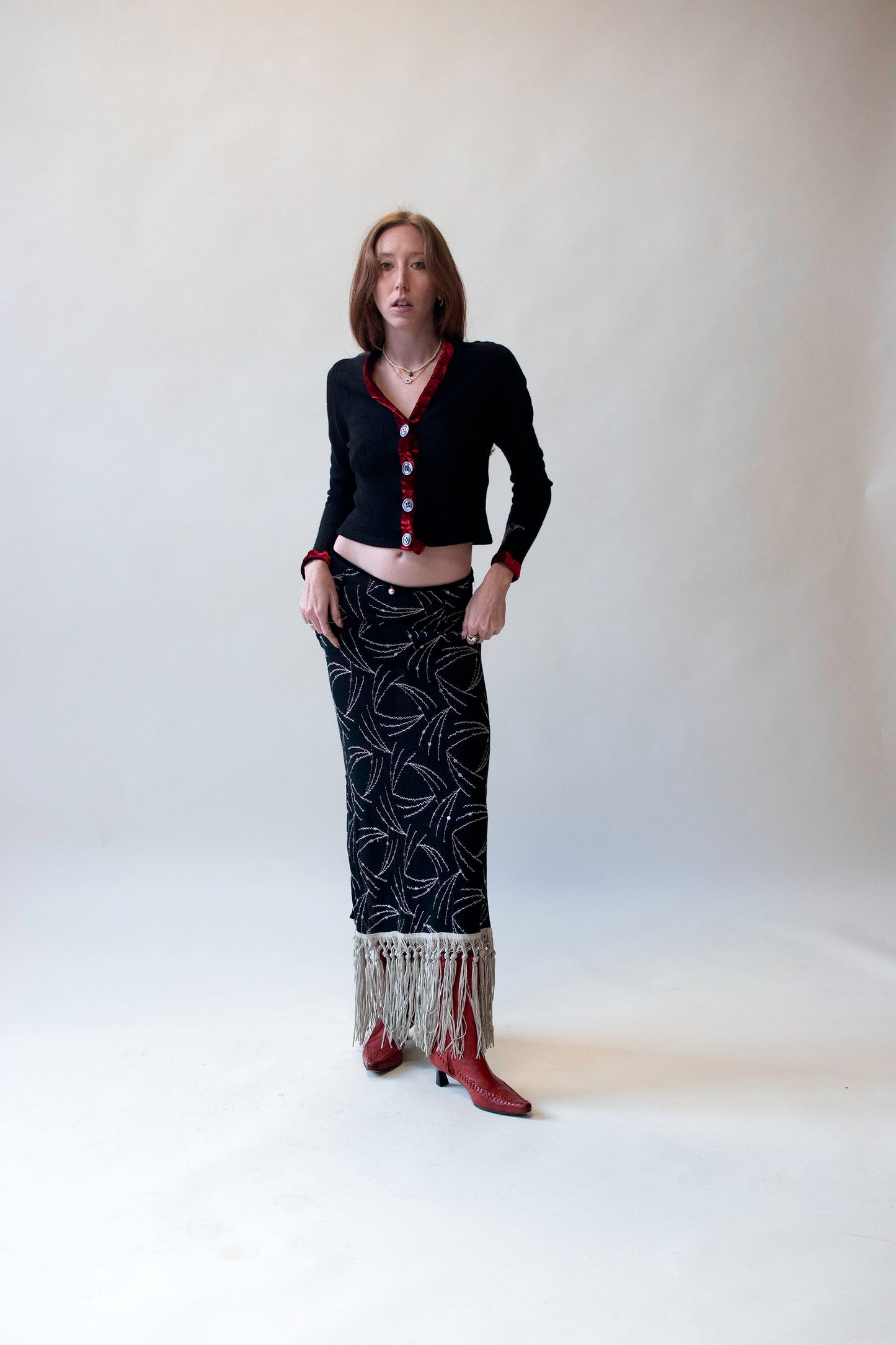 Black Knit Skirt w/ sequins and fringe | Voyage Invest in the Original