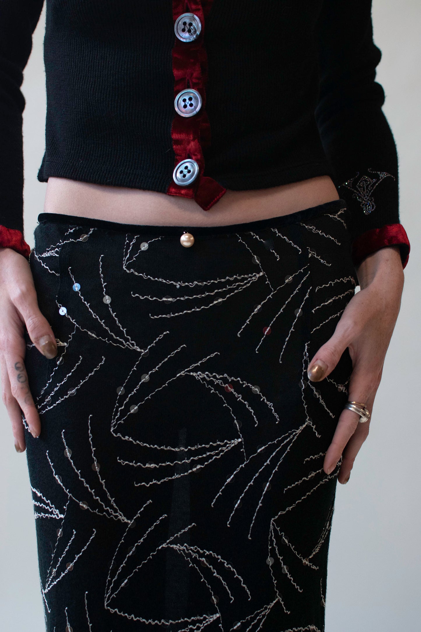 Black Knit Skirt w/ sequins and fringe | Voyage Invest in the Original