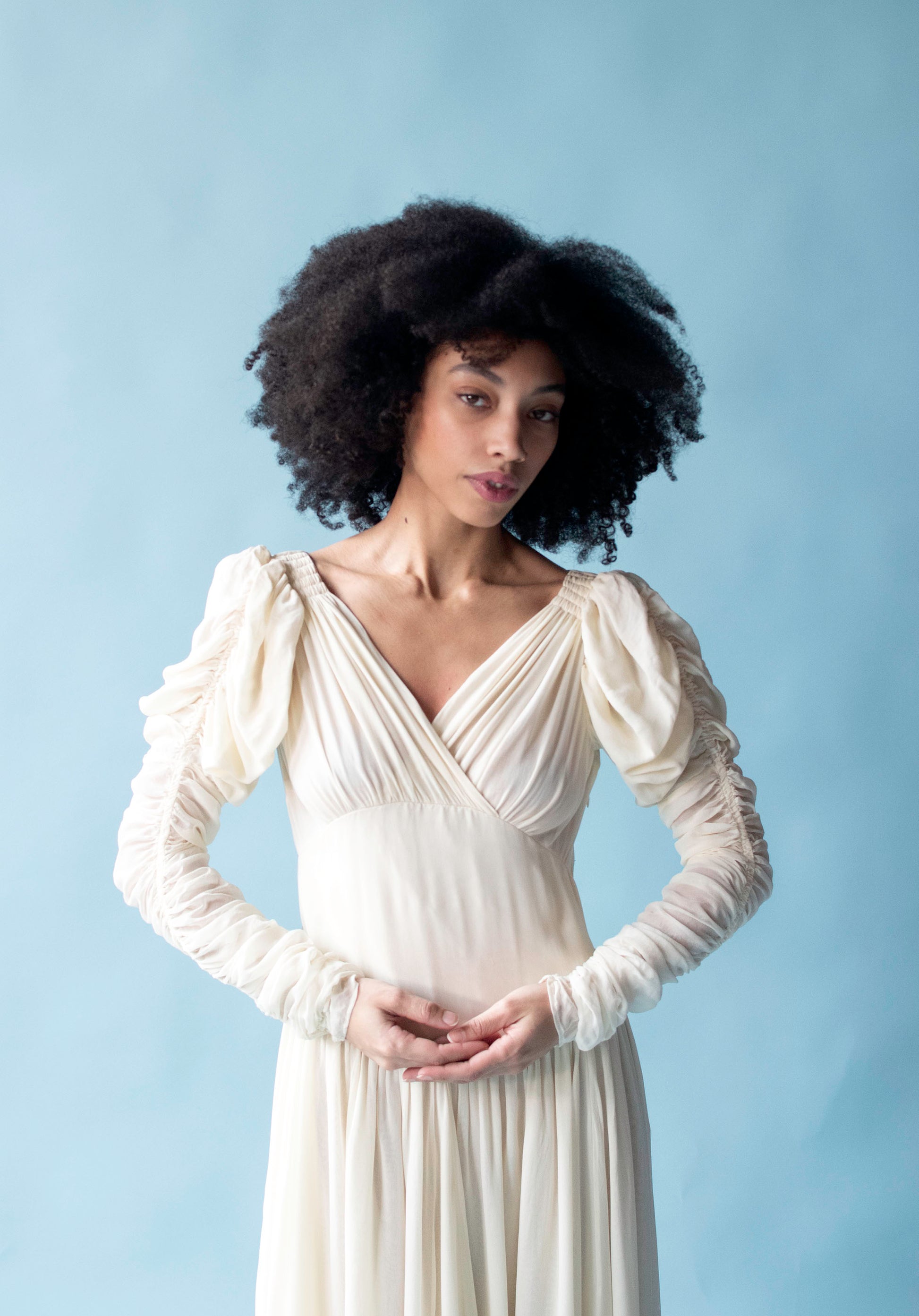 dresses norma kamali Draped halterneck gown allowing its cut and craftsmanship to take center stage without distraction Chiffon Dress| Norma Kamali