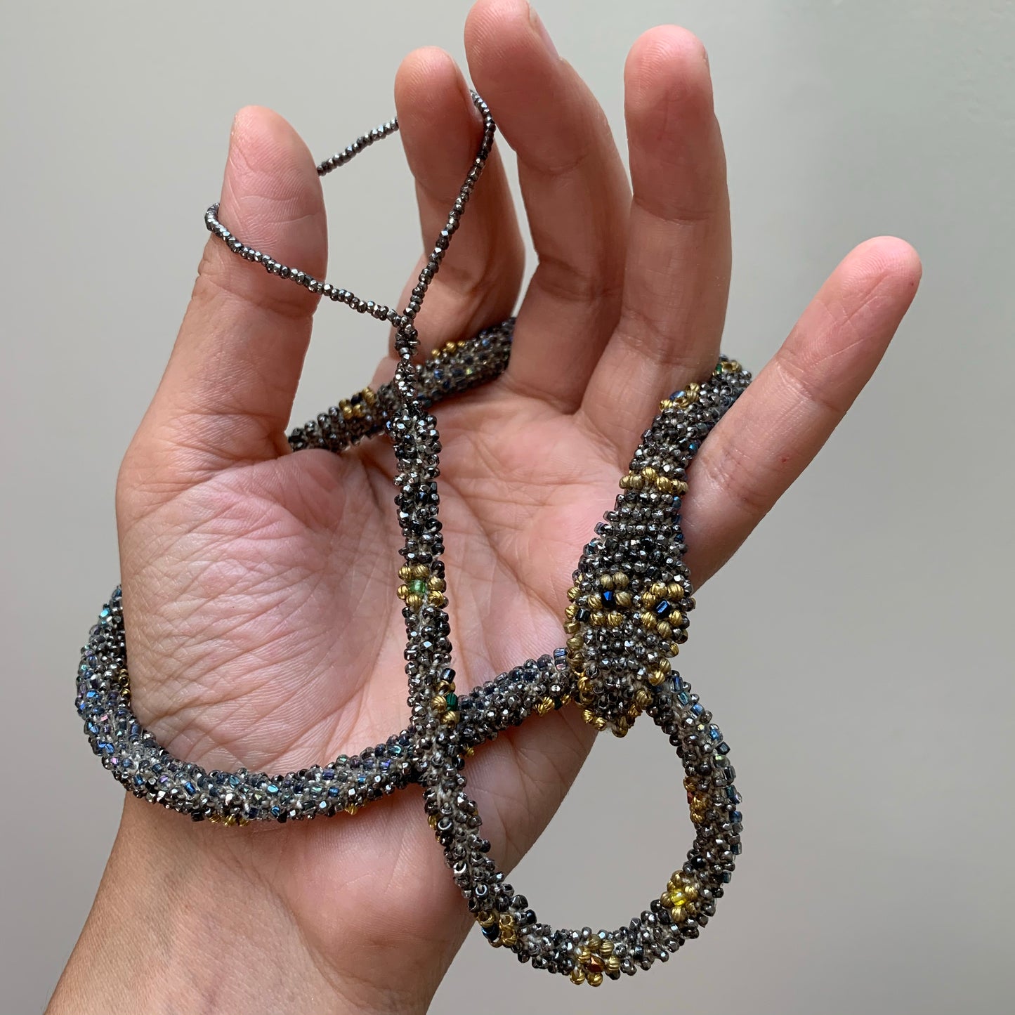 Bead Crochet Snake Necklace | Antique steel cut, Torse and glass beads